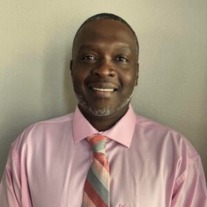 Professional photo of Tremain Doctor, Manager of Medical Documentation at TriWest Healthcare Alliance and retired U.S. Army Sergeant Major, who shared a testimonial about Dr. Alisha Smith’s leadership and mentorship.